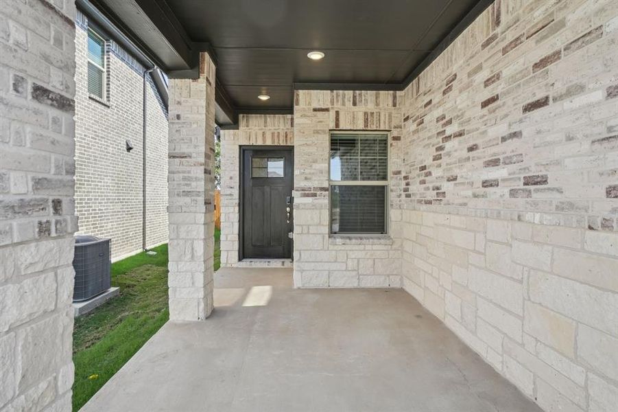 Exterior details and patio area of a home in Eastridge - Spring Series, McKinney (Image 23). Exterior details and patio area of a home in Eastridge - Spring Series, McKinney (Image 23).