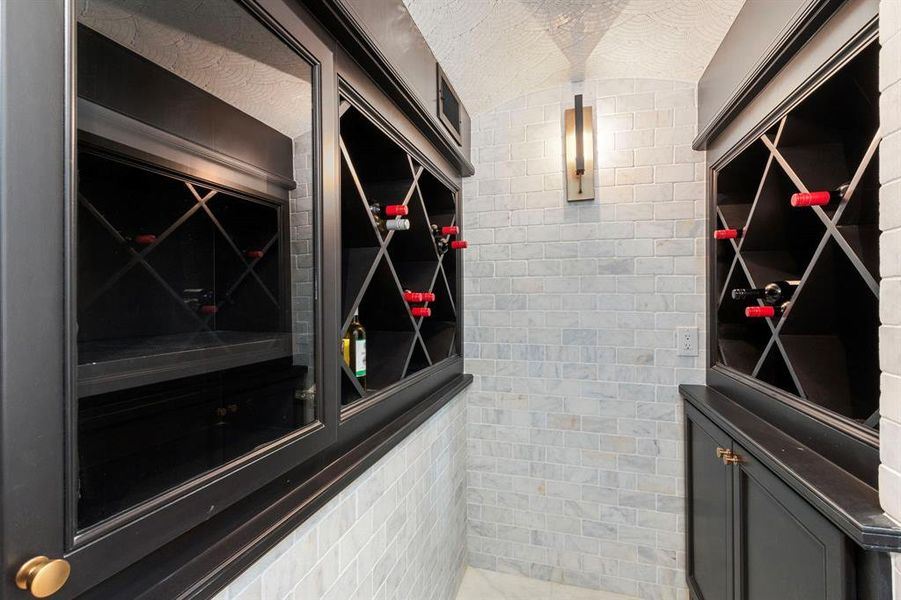 RARE below ground temp controlled wine room w/ entrance in the Formal Dining Room.