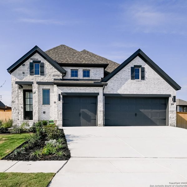 Front exterior of a new home in Mayfair 50', New Braunfels, TX, highlighting curb appeal (Image 19). Front exterior of a new home in Mayfair 50', New Braunfels, TX, highlighting curb appeal (Image 19).