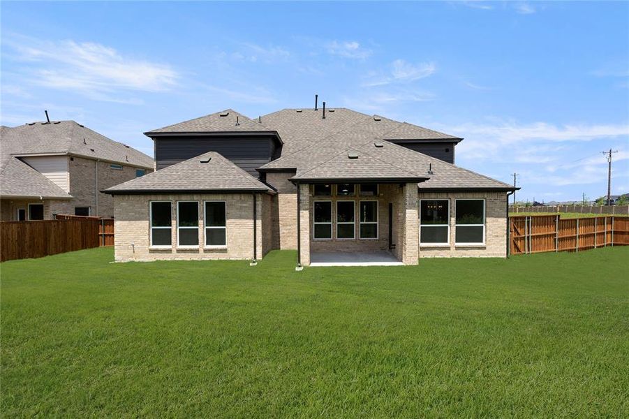 Front exterior of a new home in Villages of Creekwood, Frisco, TX, highlighting curb appeal (Image 2). Front exterior of a new home in Villages of Creekwood, Frisco, TX, highlighting curb appeal (Image 2).