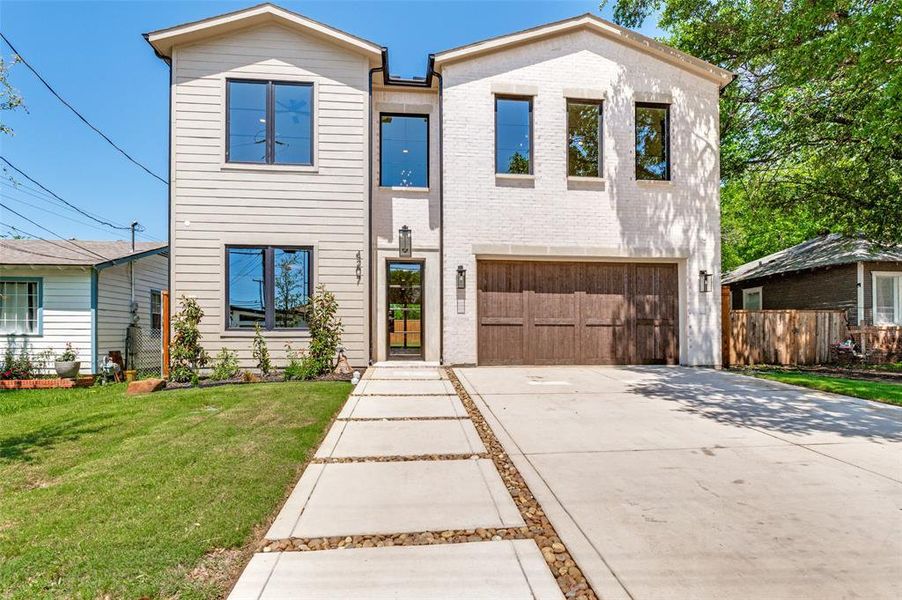 Front exterior of a new home in , Dallas, TX, highlighting curb appeal (Image 2). Front exterior of a new home in , Dallas, TX, highlighting curb appeal (Image 2).