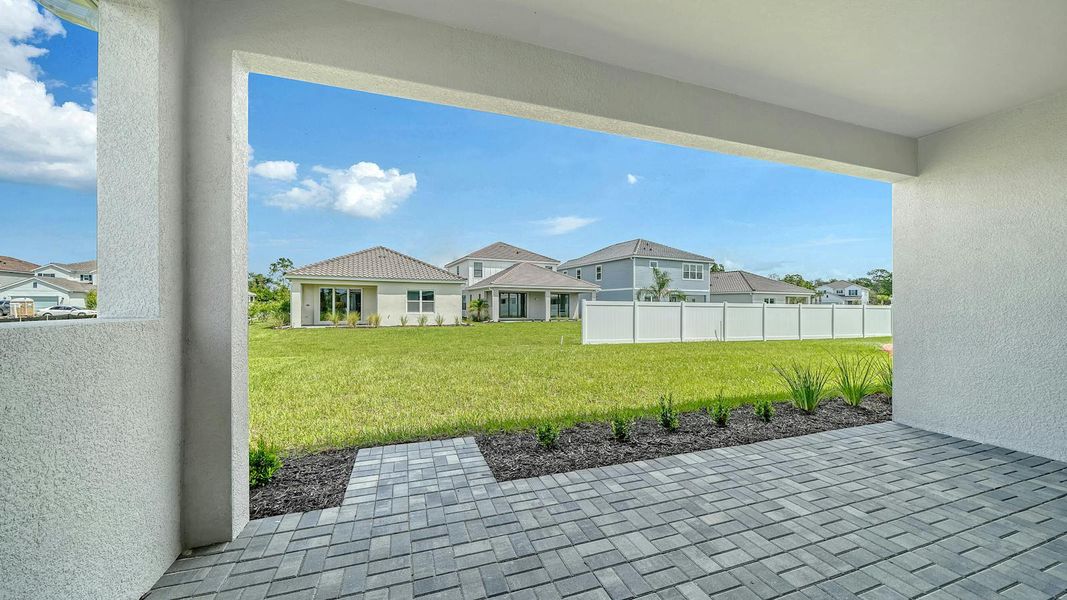 Exterior details and patio area of a home in Windward Real Estate and Homes for Sale in Sarasota, FL - Neal Communities, Lakewood Ranch (Image 4).