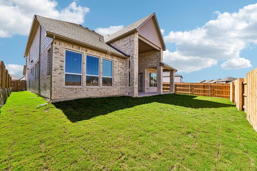 Exterior details and patio area of a home in Sunfield, Buda (Image 4).