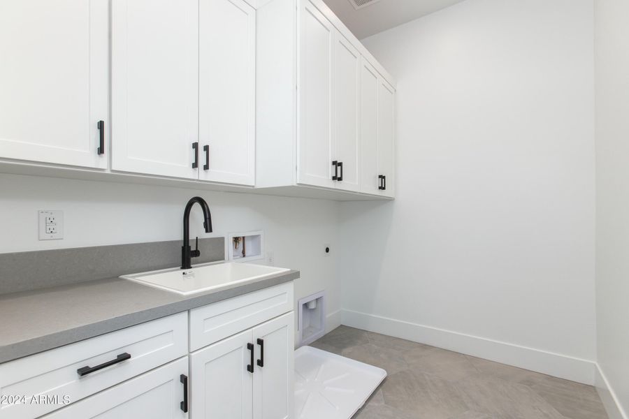 Laundry with storage & utility sink