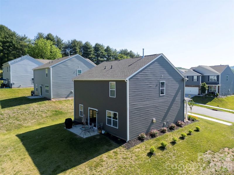 Exterior details and patio area of a home in Valleywood Farms, Waynesville (Image 25).