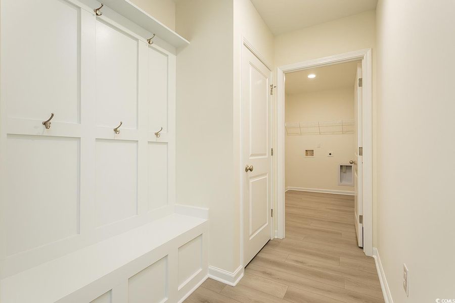 Mudroom featuring light wood finished floors and recessed lighting Mudroom featuring light wood finished floors and recessed lighting