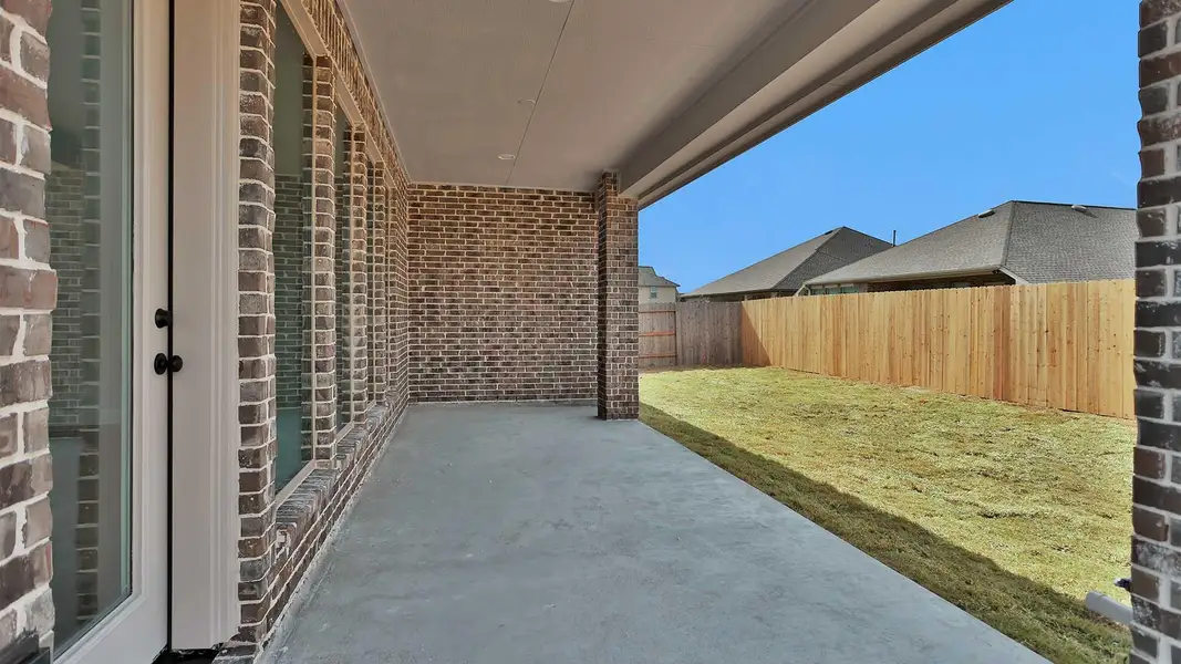Exterior details and patio area of a home in StoneCreek Estates, Richmond (Image 4).