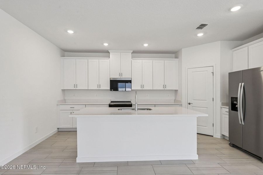 Furnished interior view inside a new home in Colbert Landings, Palm Coast (Image 8).