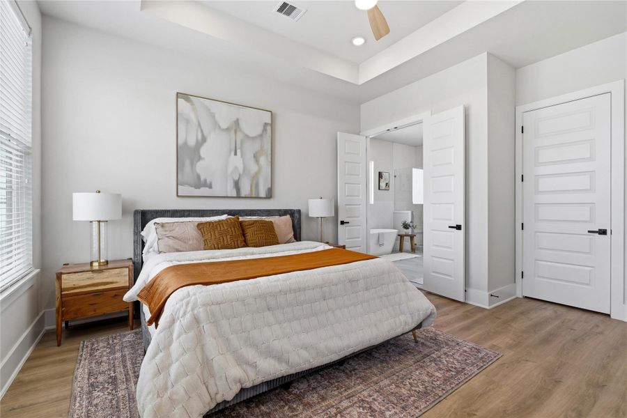 Positioned for both privacy and convenience, the primary suite flows naturally into the ensuite bath and closet areas. Positioned for both privacy and convenience, the primary suite flows naturally into the ensuite bath and closet areas.