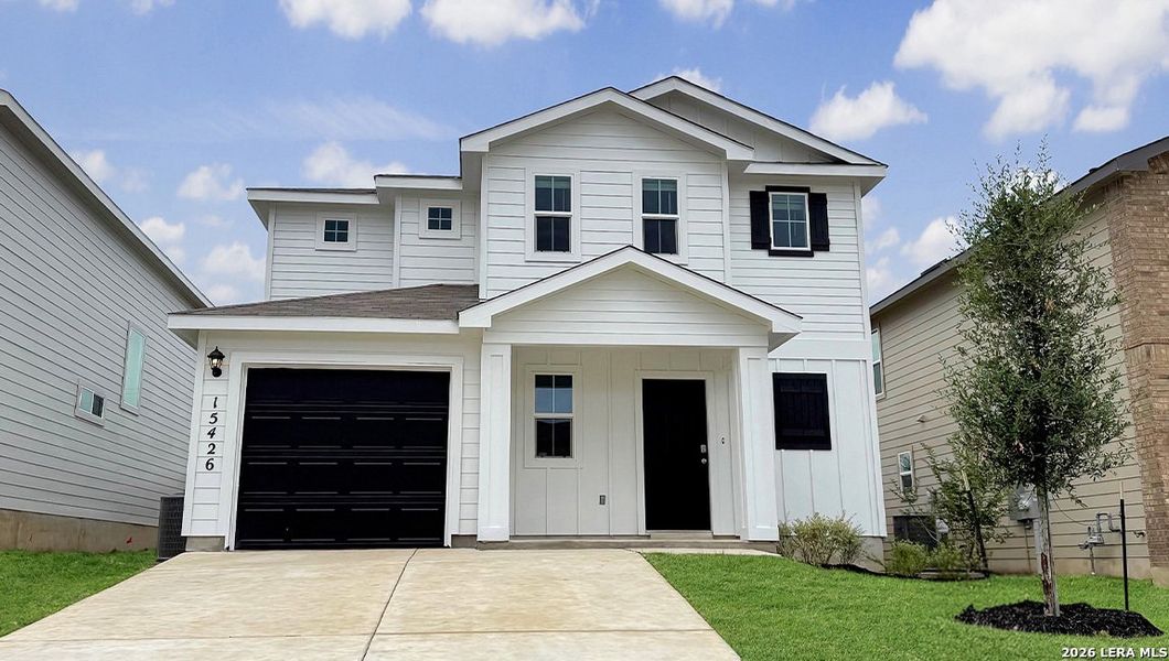 Front exterior of a new home in Redbird Ranch, San Antonio, TX, highlighting curb appeal (Image 1). Front exterior of a new home in Redbird Ranch, San Antonio, TX, highlighting curb appeal (Image 1).