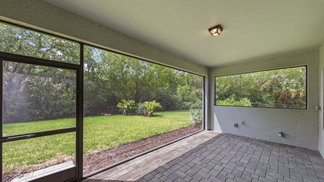Exterior details and patio area of a home in Verandah Real Estate and Homes for Sale in Fort Myers, FL - Neal Communities, Fort Myers (Image 27). Exterior details and patio area of a home in Verandah Real Estate and Homes for Sale in Fort Myers, FL - Neal Communities, Fort Myers (Image 27).