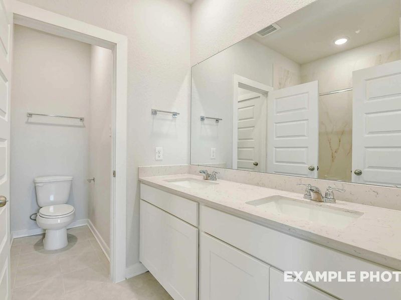 Furnished interior view inside a new home in Caney Creek Place, Conroe (Image 9).