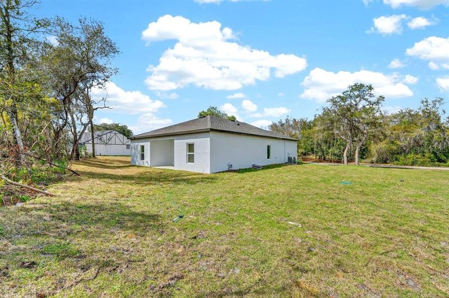 Exterior details and patio area of a home in , Deltona (Image 24).