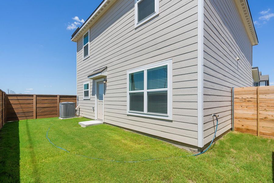 Exterior details and patio area of a home in Canyon Ranch, Jarrell (Image 1).