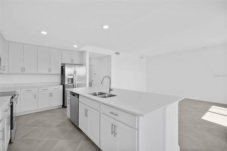 Furnished interior view inside a new home in Wellen Park Golf & Country Club, Venice (Image 7).