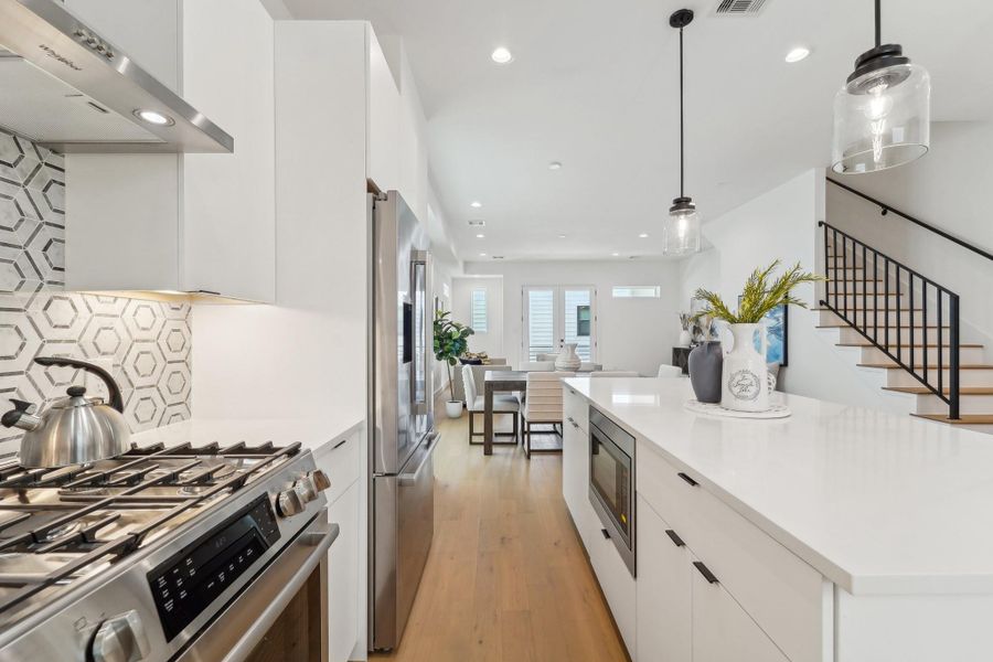 Photos show similar floor plan & alternative finishes from the previous development. Selections may vary.