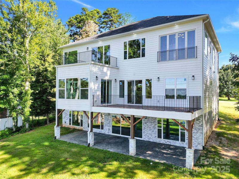 Huge covered patio off the walk out basement with lake views, perfect for outdoor entertaining! Huge covered patio off the walk out basement with lake views, perfect for outdoor entertaining!