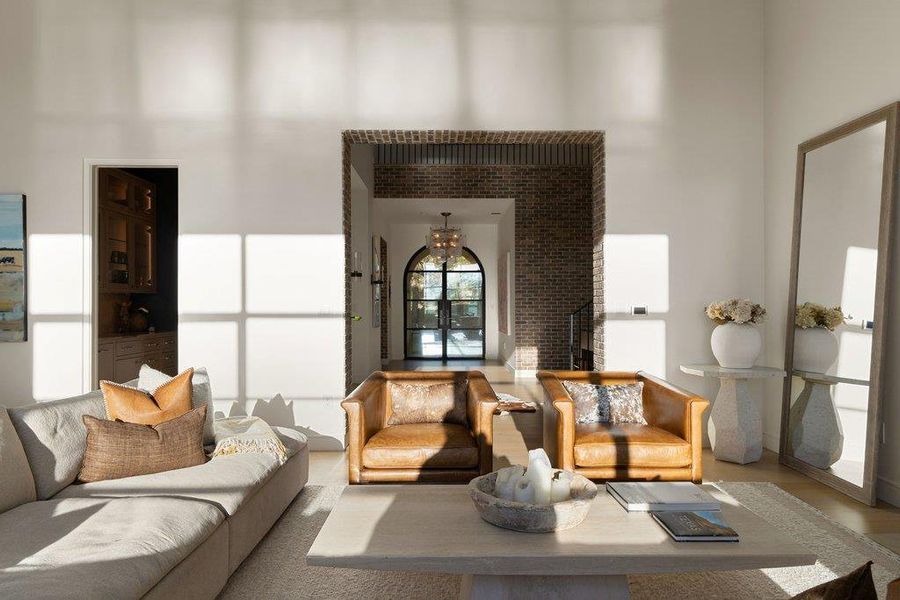 Living room featuring a high ceiling