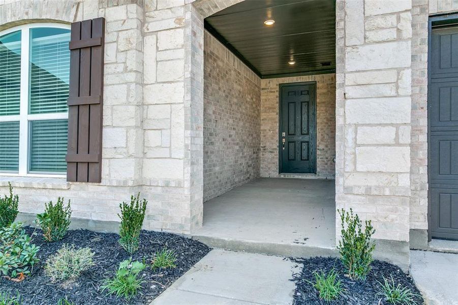 Exterior details and patio area of a home in The Preserve, Justin (Image 3). Exterior details and patio area of a home in The Preserve, Justin (Image 3).