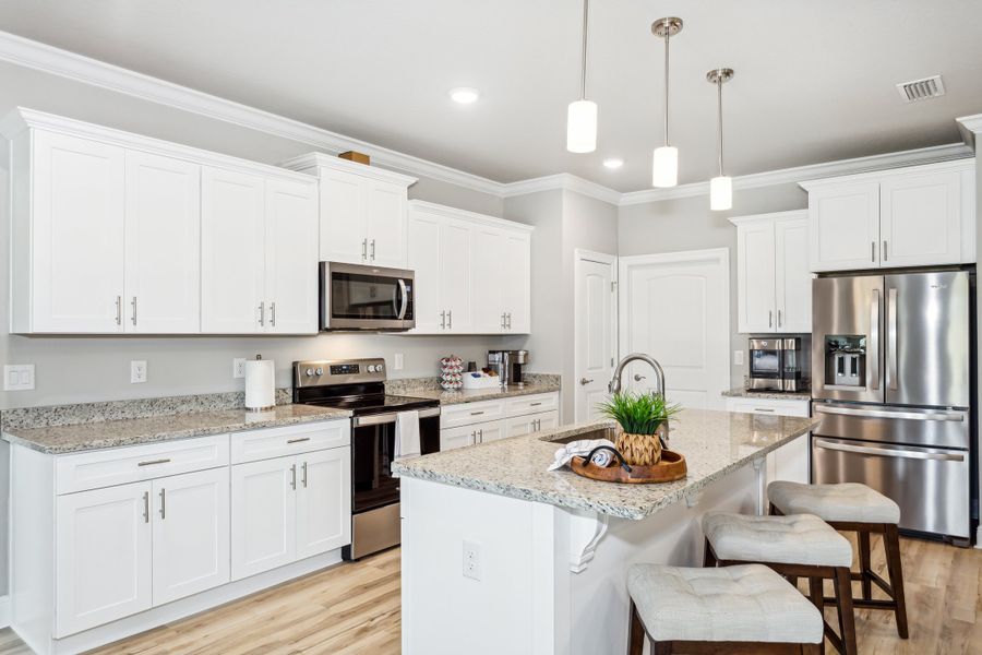 Representative furnished interior of a home built from the The Sapphire by Herbst Homes in Prosperity Point, Milton (Image 10).