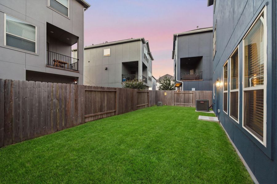 Exterior details and patio area of a home in , Houston (Image 4). Exterior details and patio area of a home in , Houston (Image 4).