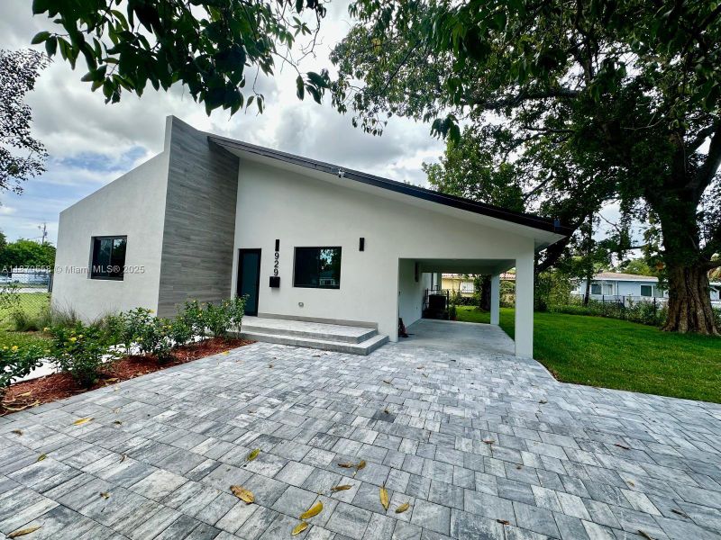 Front exterior of a new home in , Miami, FL, highlighting curb appeal (Image 22).