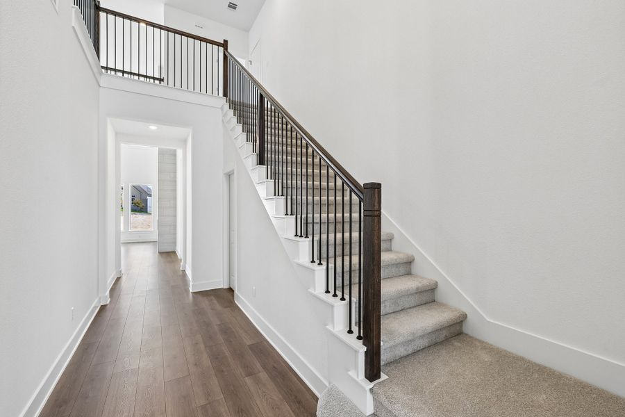 Representative unfurnished interior of a home built from the Rainey by Taylor Morrison in Santa Rita Ranch, Liberty Hill (Image 22).