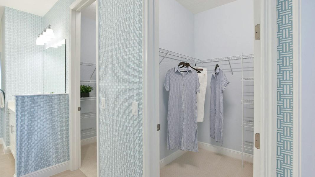 Furnished interior view inside a new home in Palm Grove Real Estate and Homes for Sale in Lakewood Ranch, FL - Neal Communities, Lakewood Ranch (Image 19).