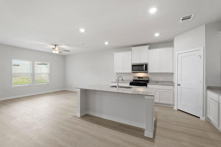 Furnished interior view inside a new home in Lexington Heights, Willis (Image 9). Furnished interior view inside a new home in Lexington Heights, Willis (Image 9).