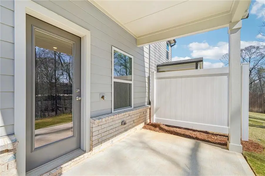 Exterior details and patio area of a home in Eastlyn Crossing, Flowery Branch (Image 4). Exterior details and patio area of a home in Eastlyn Crossing, Flowery Branch (Image 4).