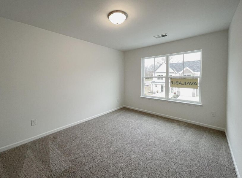 Spacious, unfurnished interior of a new home in East Main Townes, Spartanburg (Image 23).