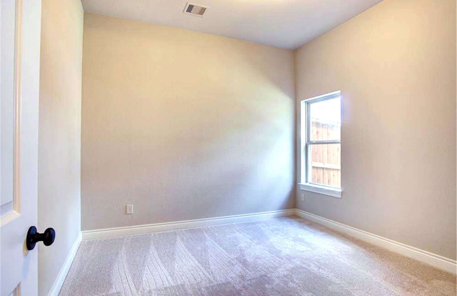 Representative unfurnished interior of a home built from the 4198 by Ravenna Homes in The Woodlands Hills 65′, Willis (Image 31).