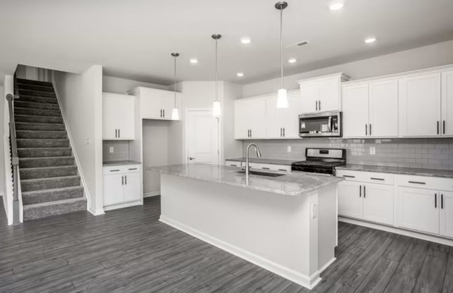 Furnished interior view inside a new home in Saunders Farm, Willow Spring (Image 3). Furnished interior view inside a new home in Saunders Farm, Willow Spring (Image 3).