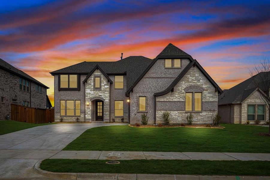Front exterior of a new home in Terracina, Rockwall, TX, highlighting curb appeal (Image 2). Front exterior of a new home in Terracina, Rockwall, TX, highlighting curb appeal (Image 2).