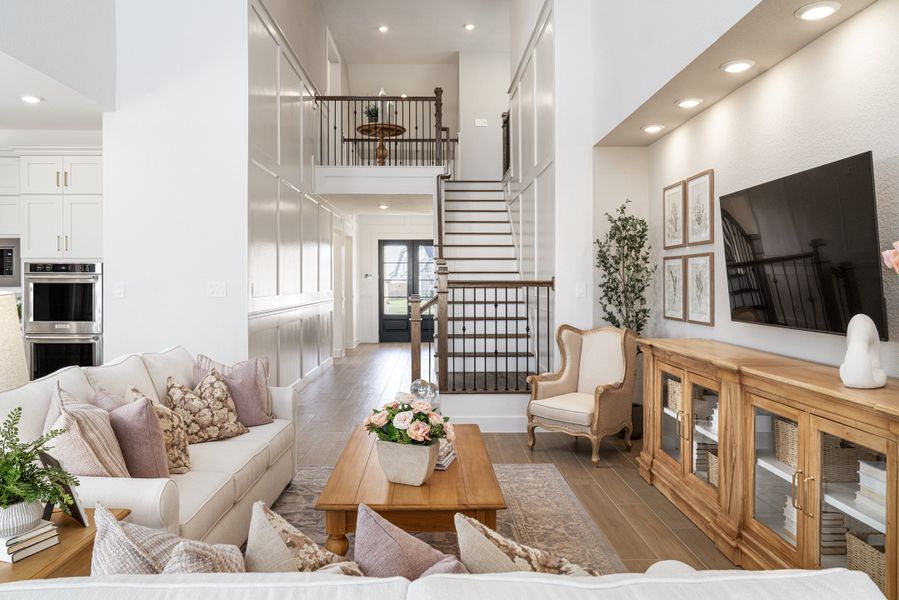 Furnished interior view inside a new home in Ellwood, Iowa Colony (Image 6).