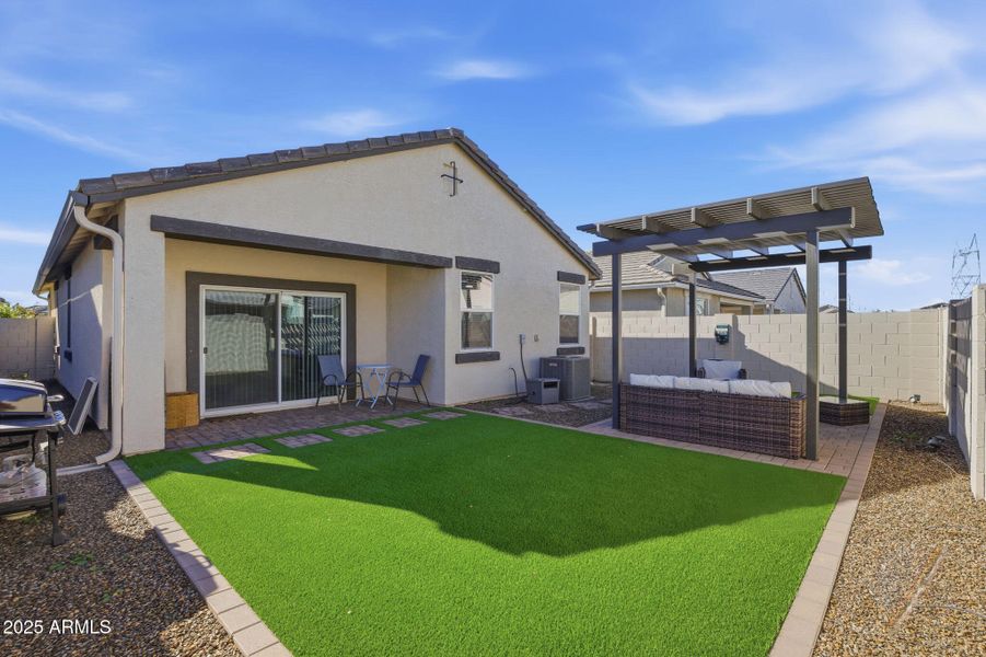 Artificial turf and custom pergola