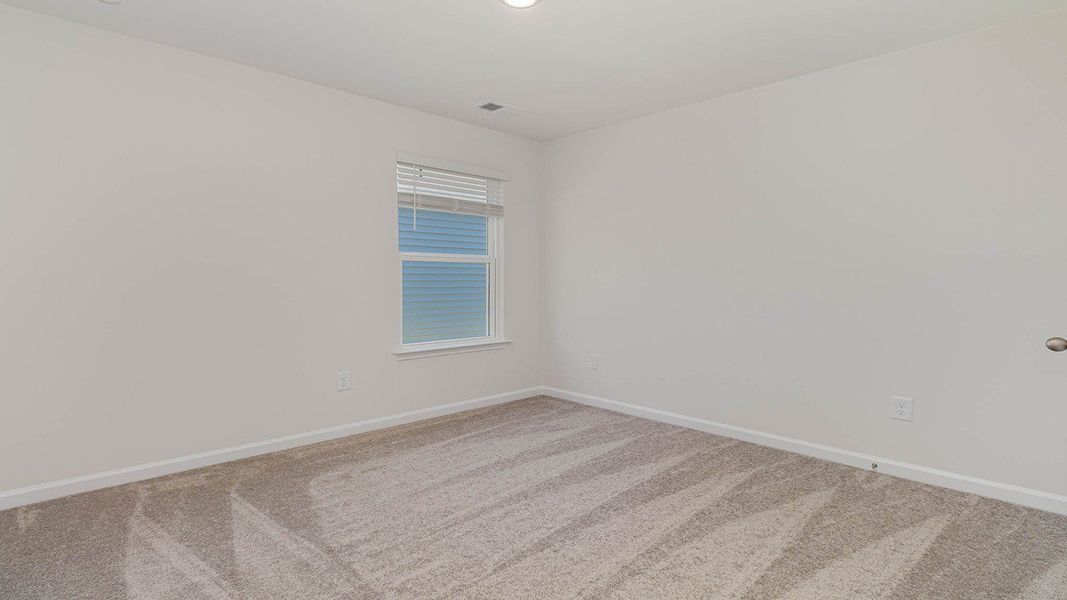 Representative unfurnished interior of a home built from the CALI by D.R. Horton in Heritage Crossing, Conway (Image 23).