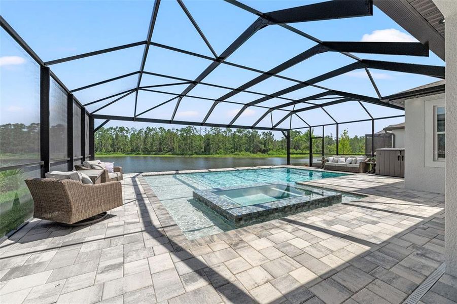 Front exterior of a new home in Whispering Oaks Preserve, Wesley Chapel, FL, highlighting curb appeal (Image 27).