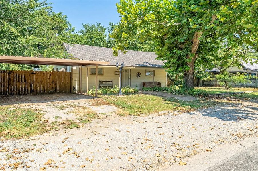 Front exterior of a new home in , Alvord, TX, highlighting curb appeal (Image 23).