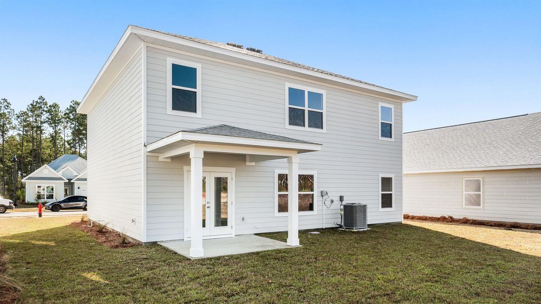 Exterior details and patio area of a home in Bayside at Ward Creek, Panama City Beach (Image 3).