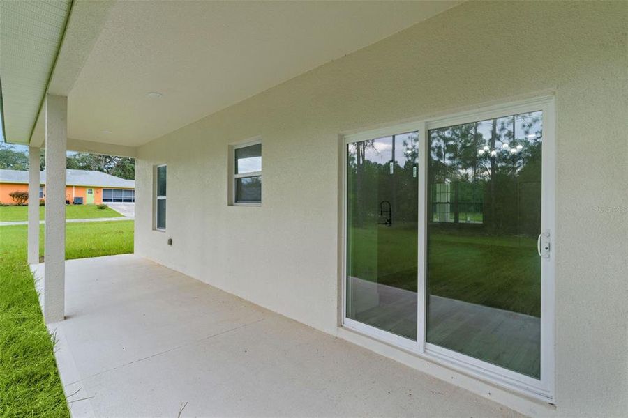 Exterior details and patio area of a home in , Citrus Springs (Image 28).