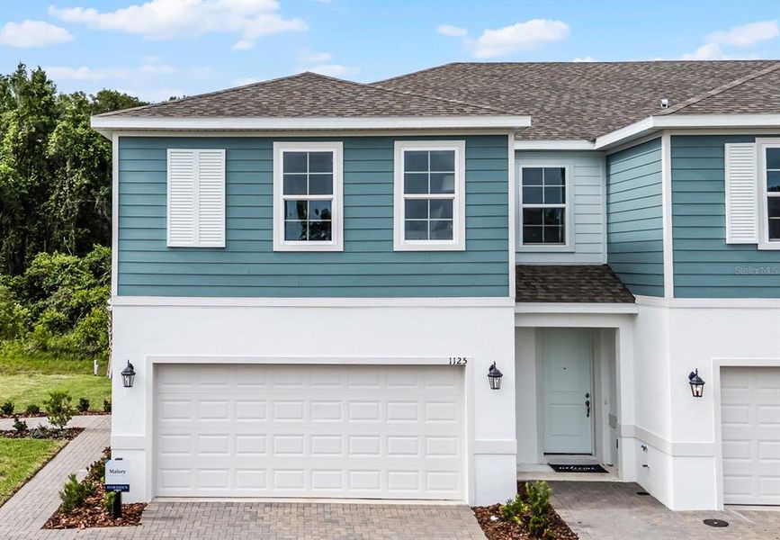 Exterior details and patio area of a home in Delaney Reserve, Deland (Image 1).