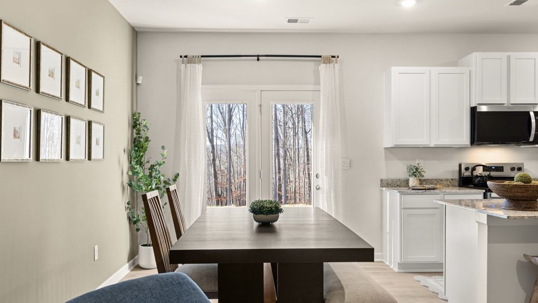 Representative furnished interior of a home built from the Sudbury 24' Townhome by D.R. Horton in Oconee Overlook Townhomes, Gainesville (Image 12).
