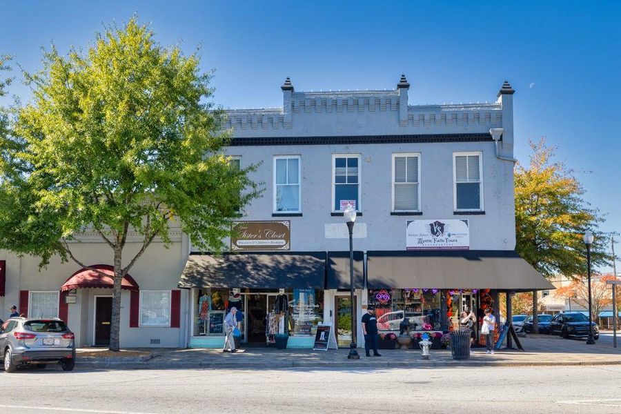 Front exterior of a new home in Pinegate, Covington, GA, highlighting curb appeal (Image 23). Front exterior of a new home in Pinegate, Covington, GA, highlighting curb appeal (Image 23).