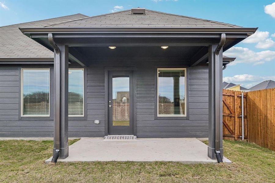 Exterior details and patio area of a home in Trails of Lavon - Signature Series, Lavon (Image 3).