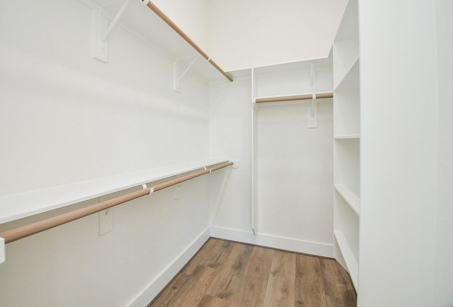 Primary Closet(Sample photo from similar floor plan built by the builder)