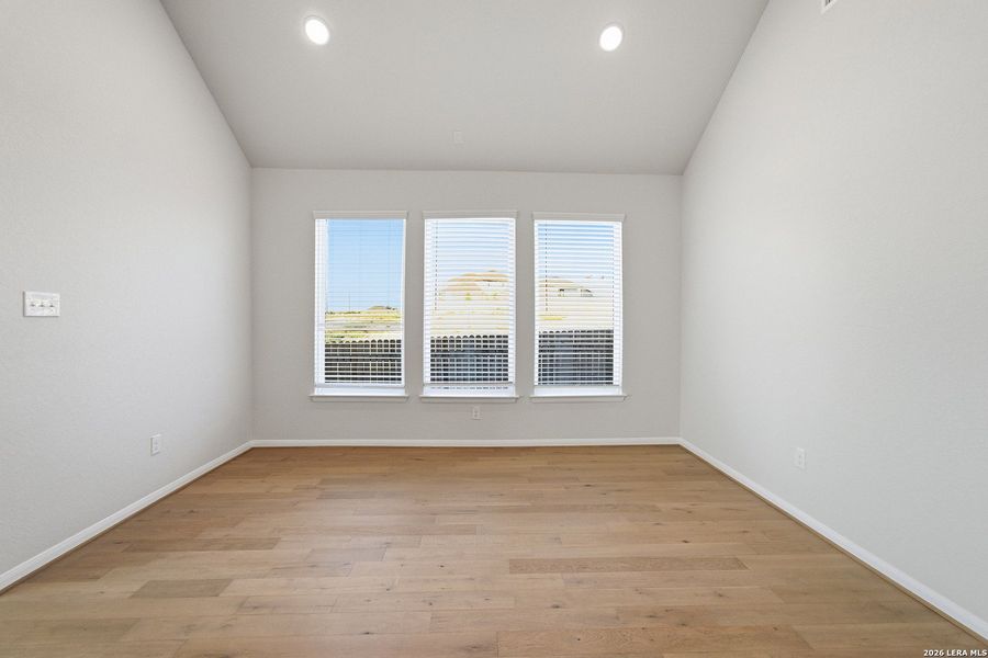 Spacious, unfurnished interior of a new home in The Woodlands at Medina Hills, Mico (Image 27).