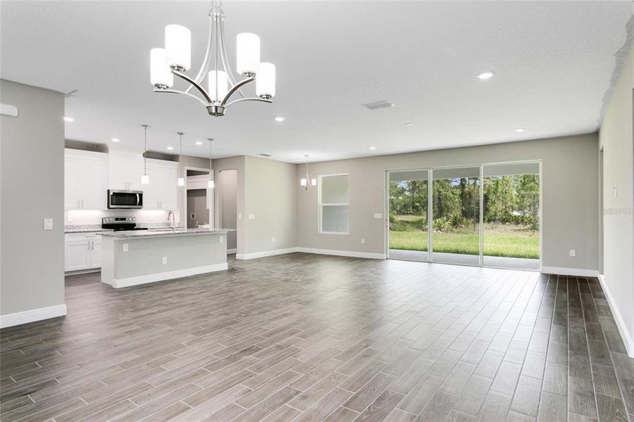 Oversized sliding glass door access to a covered lanai!