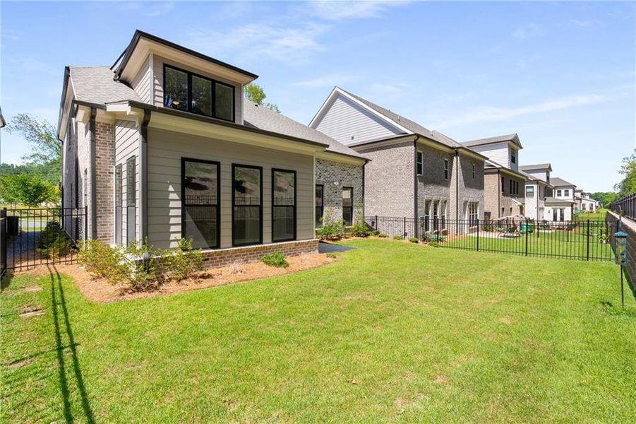 Front exterior of a new home in , Johns Creek, GA, highlighting curb appeal (Image 21). Front exterior of a new home in , Johns Creek, GA, highlighting curb appeal (Image 21).