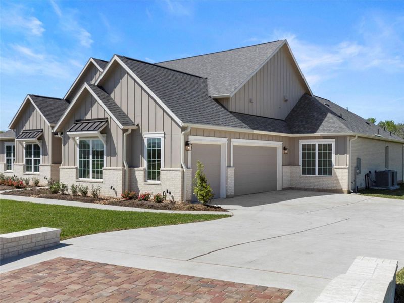 Front exterior of a new home in , Smithville, TX, highlighting curb appeal (Image 22). Front exterior of a new home in , Smithville, TX, highlighting curb appeal (Image 22).